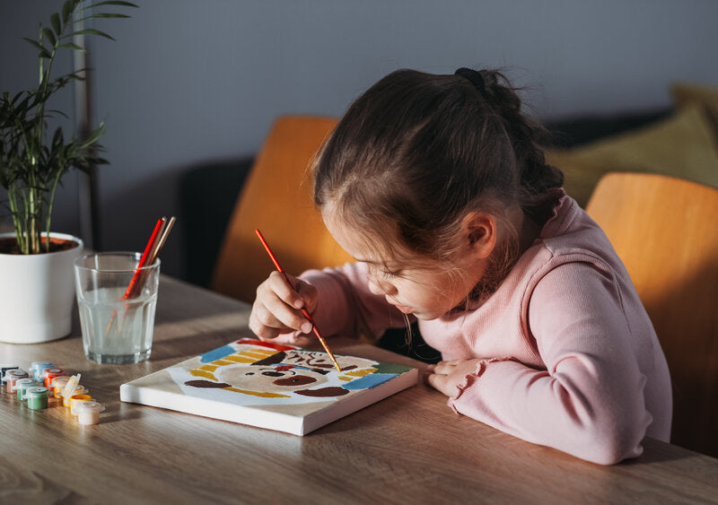 little girl painting