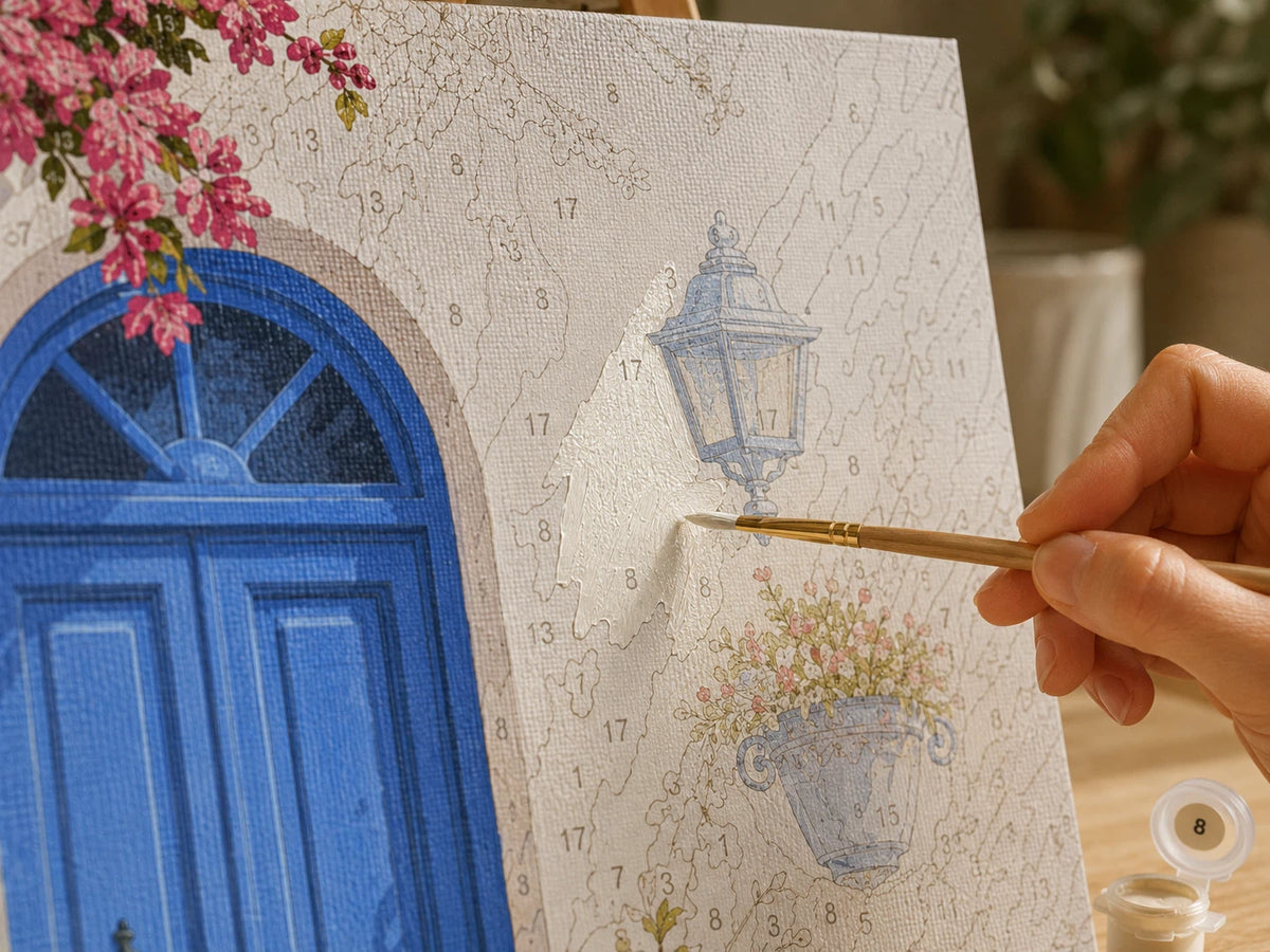 A small paint by numbers area being corrected with a fine brush
