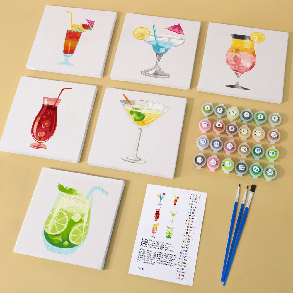 Flat lay of cocktail paint by numbers kit including numbered canvas and paints