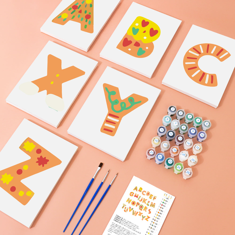 Colorful letter cards with paintbrushes and markers on a pink background