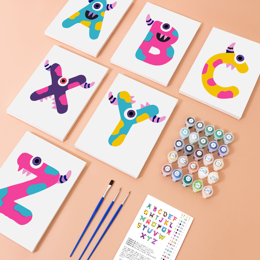 Colorful letter-shaped cards with painting supplies on a peach background
