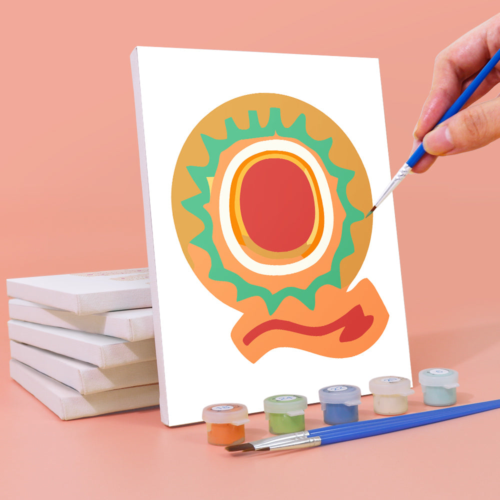 Person painting a colorful letter 'Q' on a canvas with paint and brushes.