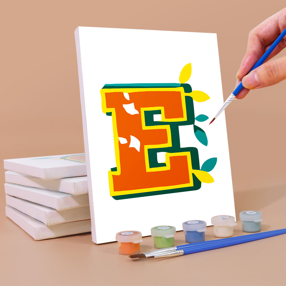 Person painting a colorful letter 'E' on a canvas with paint supplies.