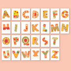 Colorful alphabet letters on a peach background