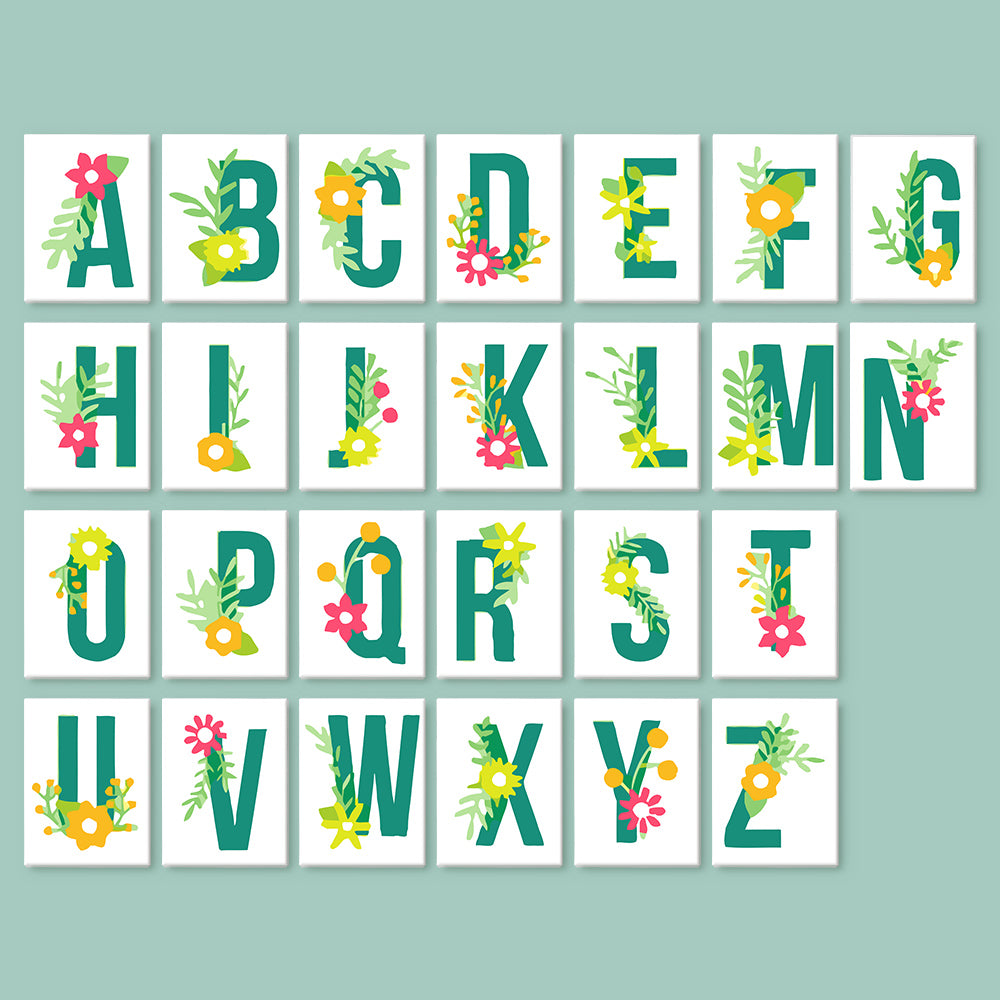 Alphabet letters with floral designs on a light blue background