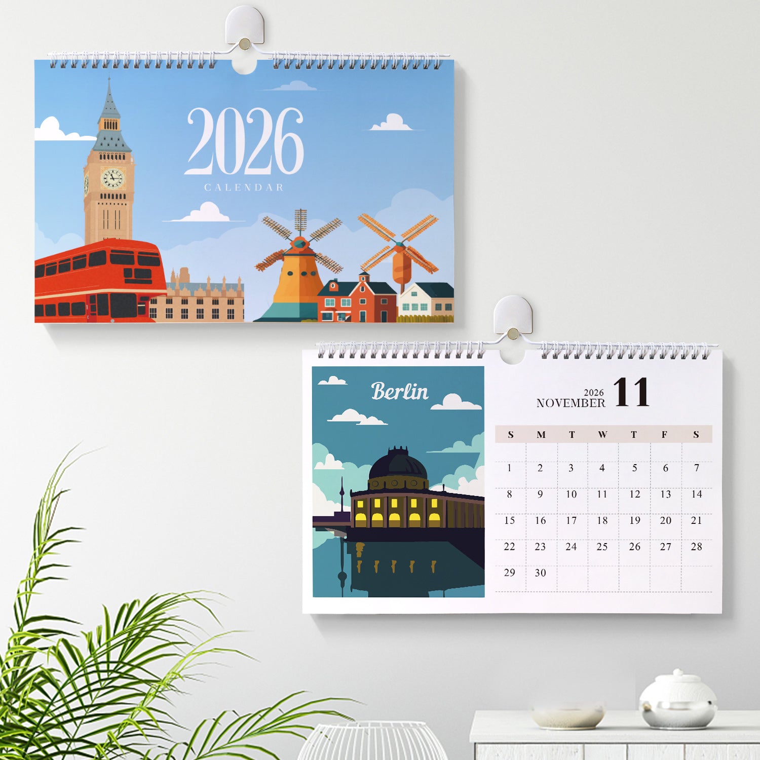 Calendar with illustrations of landmarks and cityscapes on a wall.