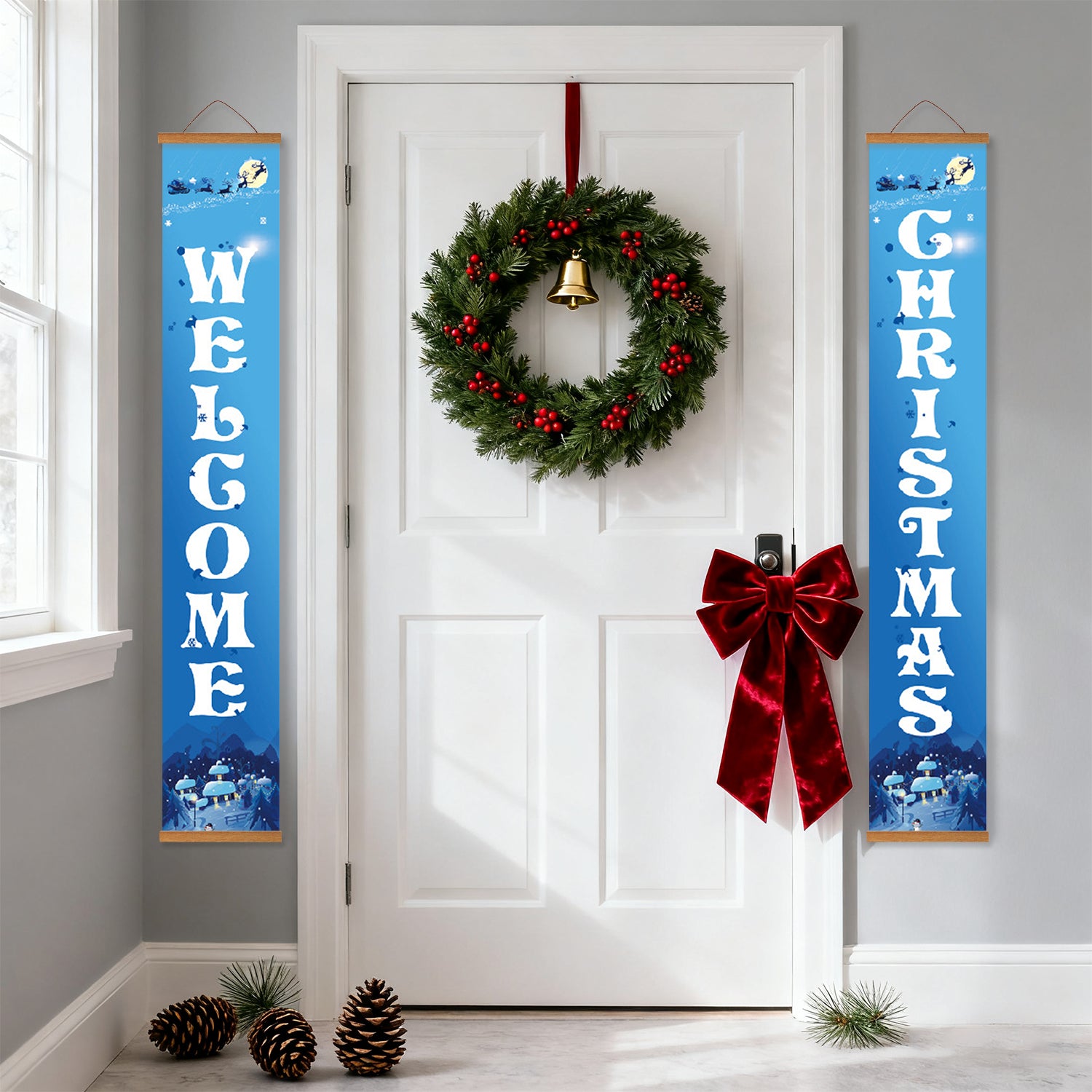 Decorative Christmas wreath with red bow on a white door, flanked by 'Welcome' and 'Christmas' vertical banners.