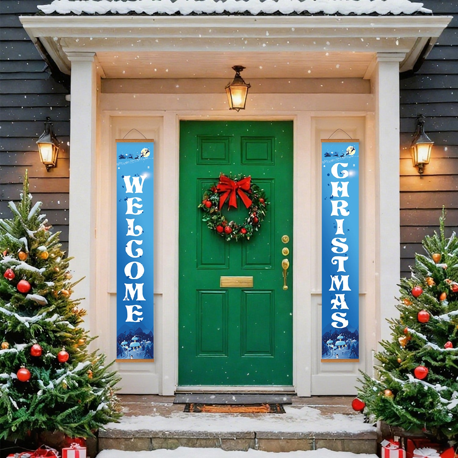 Green door with wreath flanked by 'Welcome' and 'Christmas' banners, decorated Christmas trees on either side.