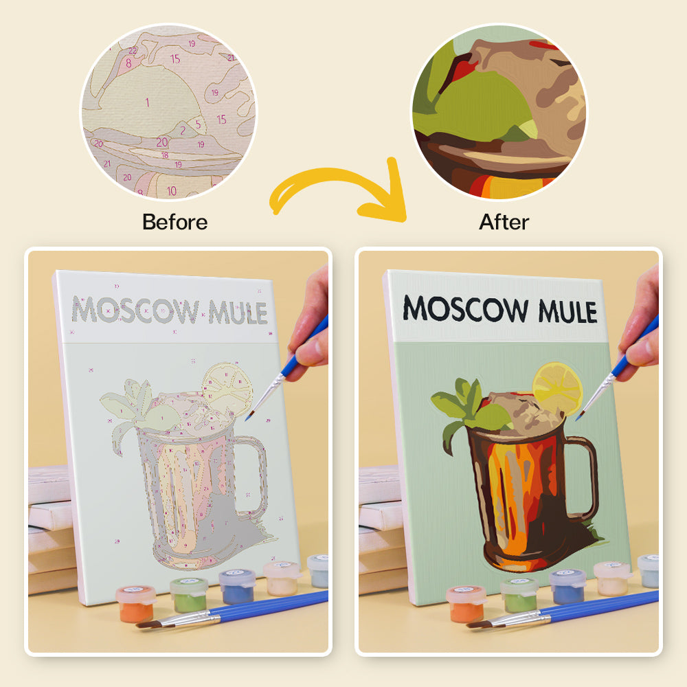 Hands painting a Sip Happens Mini Paint by Numbers canvas