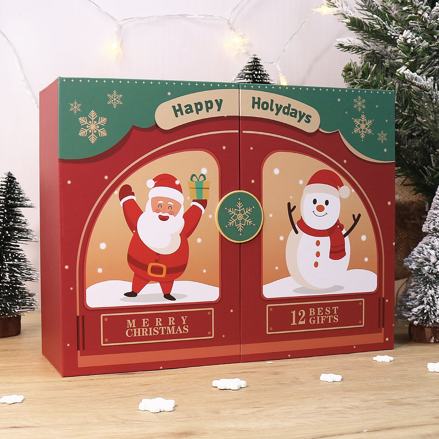 Advent calendar with Santa Claus and snowman design on a wooden surface with Christmas trees in the background.
