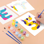 Children's art project with colorful paint and painted animal figures on a table.
