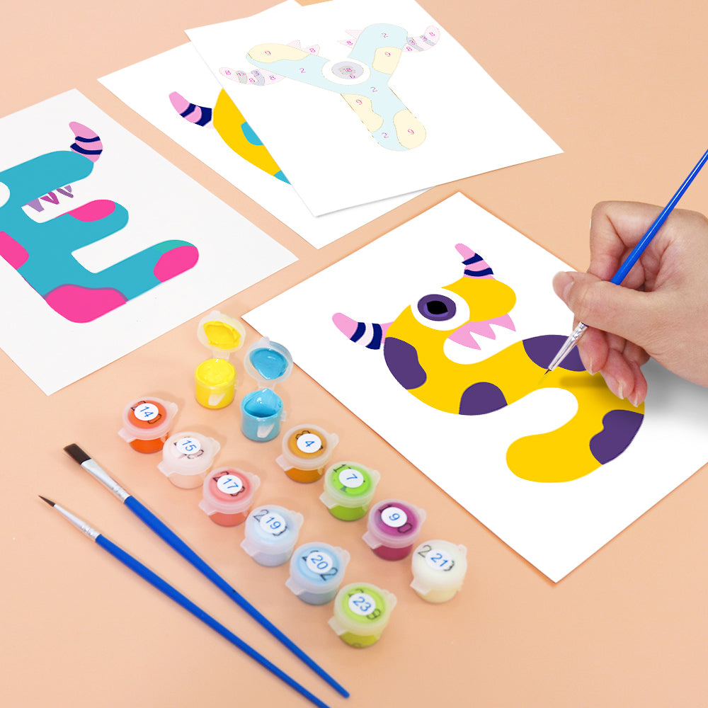 Children's art project with colorful paint and painted animal figures on a table.
