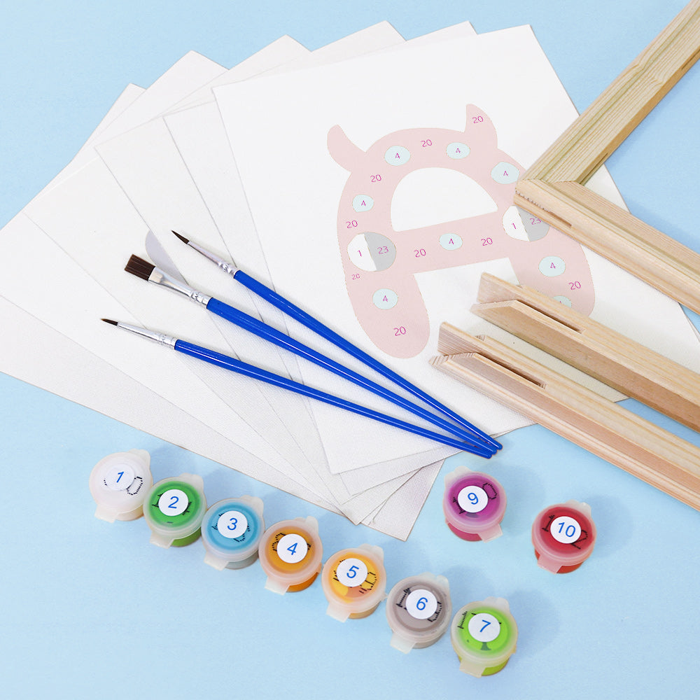 Art supplies including paintbrushes, paint pots, and a ruler on a light blue background