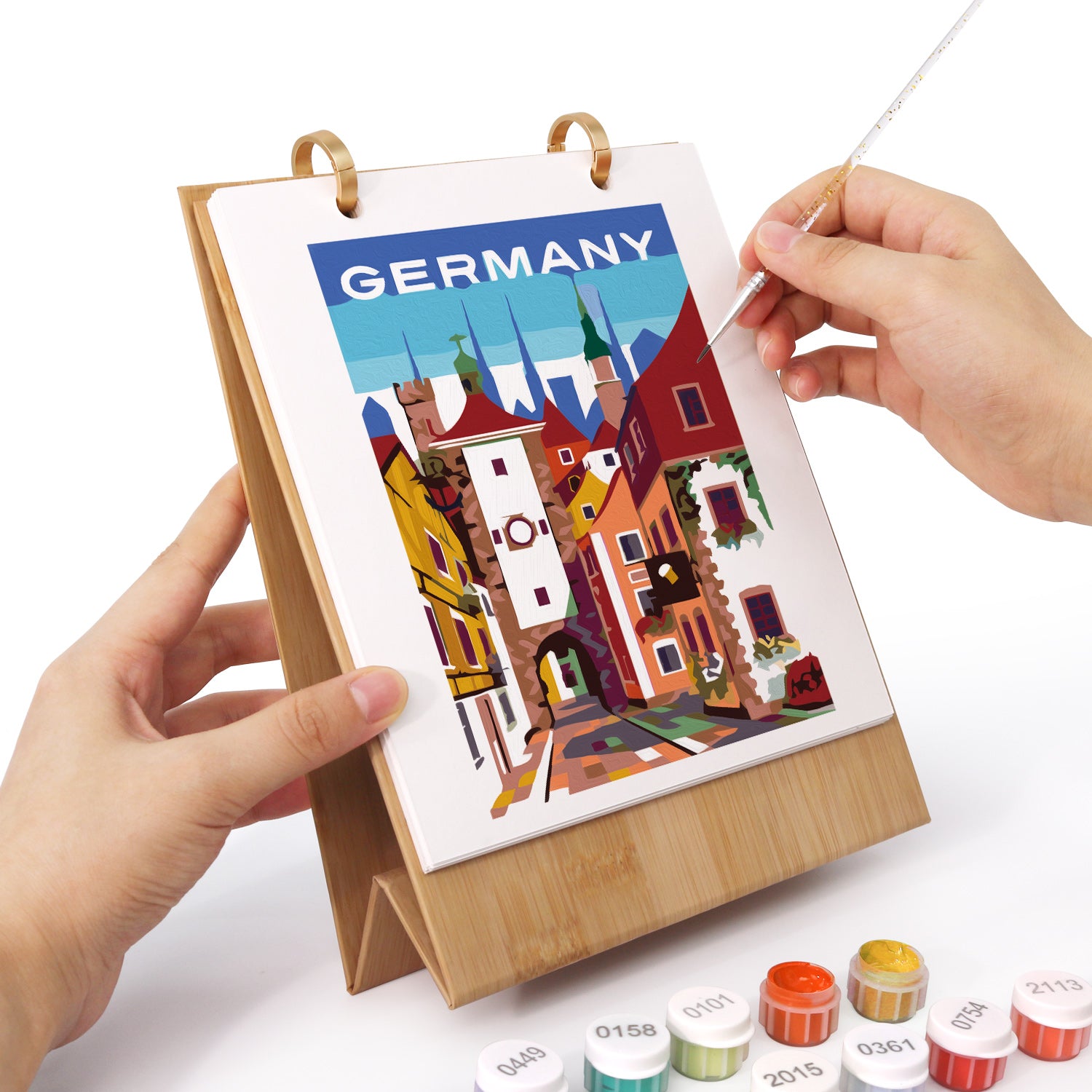 Artistic depiction of a street scene with 'GERMANY' text on a colorful poster held by a person.