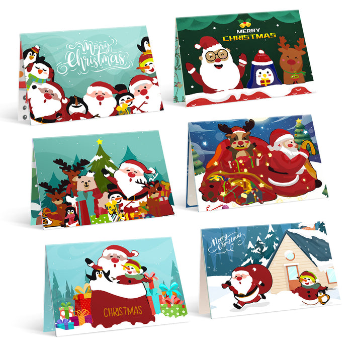 A collection of six Christmas-themed paint-by-numbers cards featuring characters like Santa, reindeer, and penguins in festive settings.