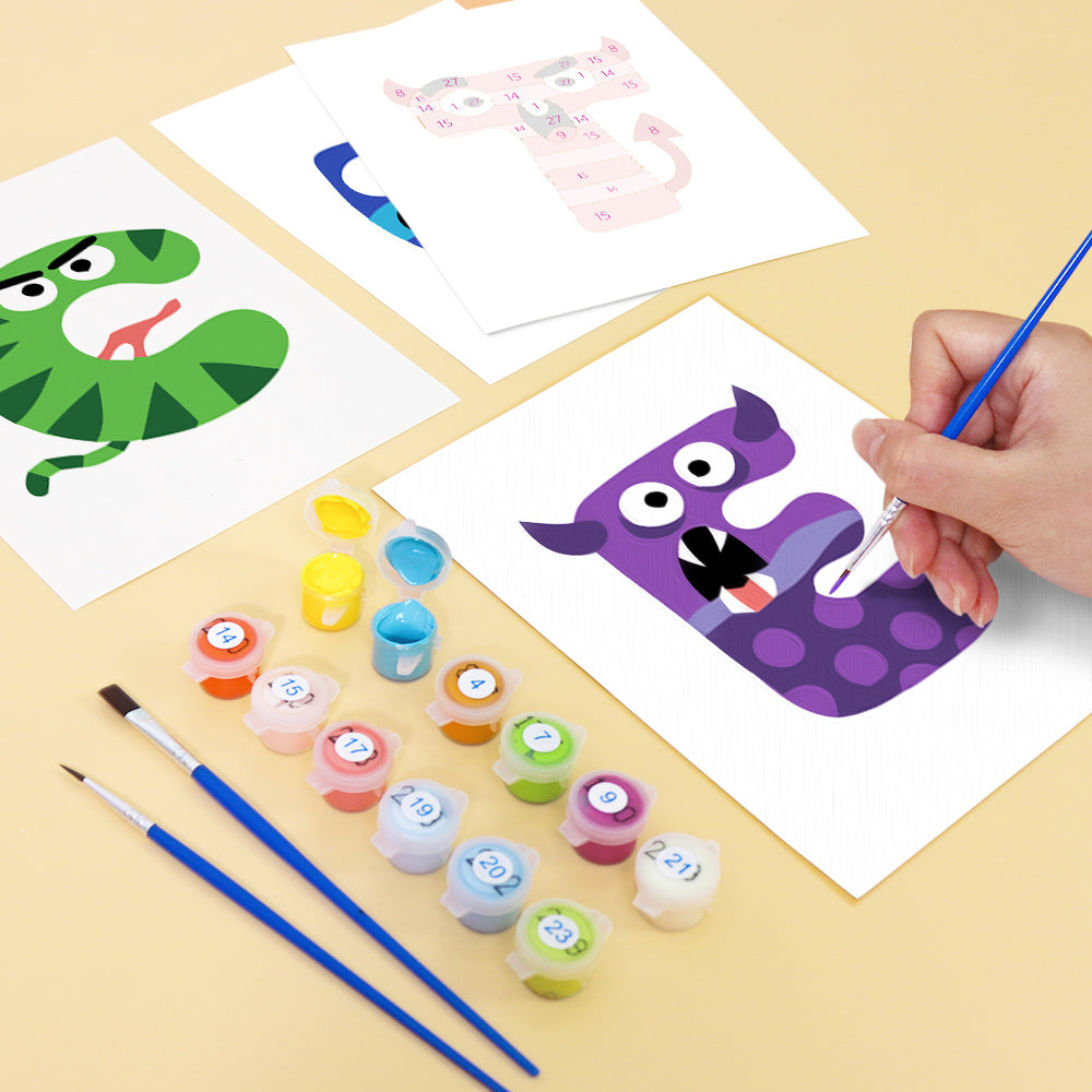 Children's art project with painted animal figures and paint containers on a table.