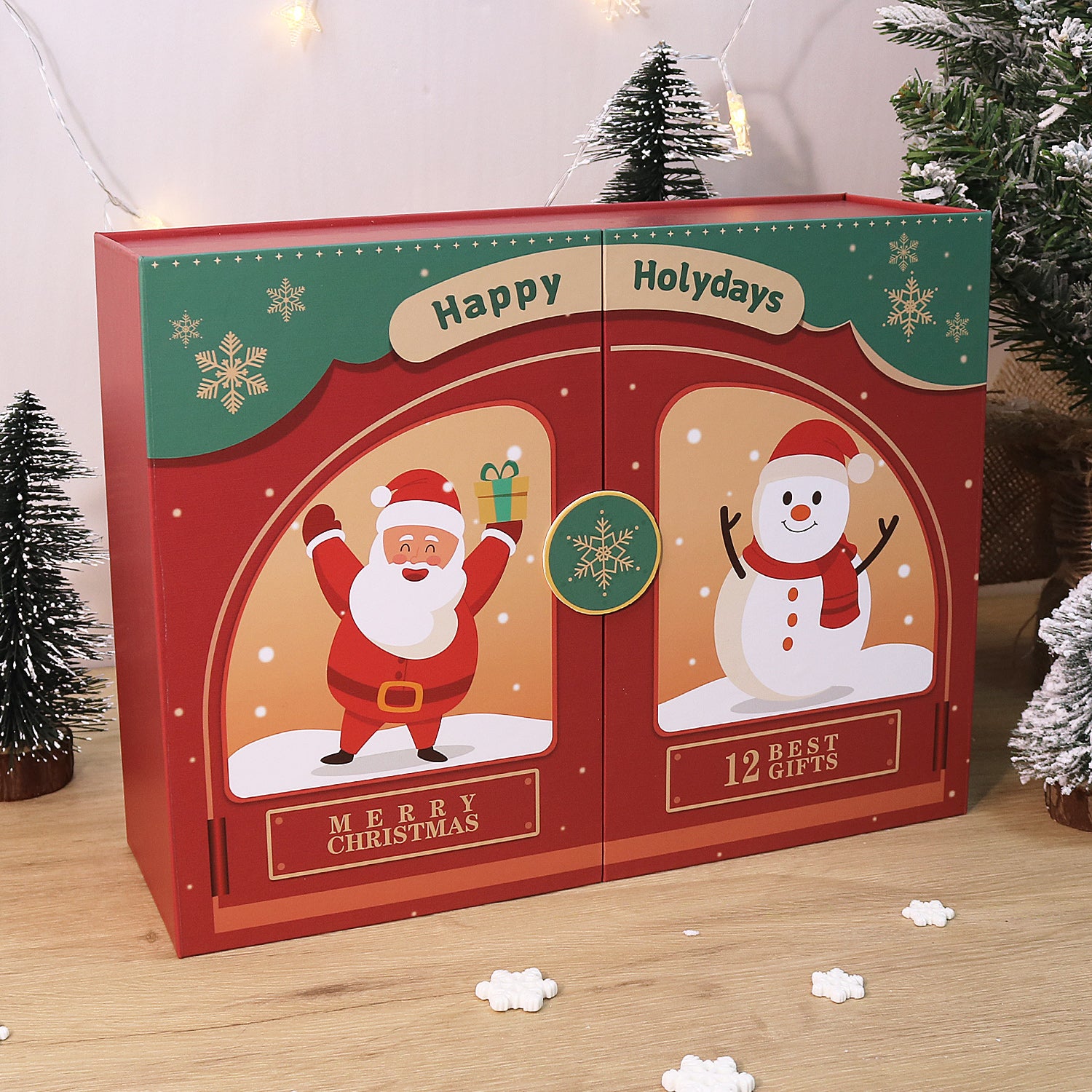 Christmas-themed gift box with Santa Claus and snowman design, surrounded by decorative trees.