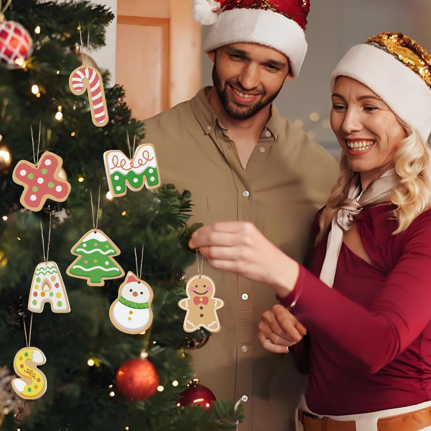 Man and woman in festive attire standing next to a Christmas tree with decorative ornaments.