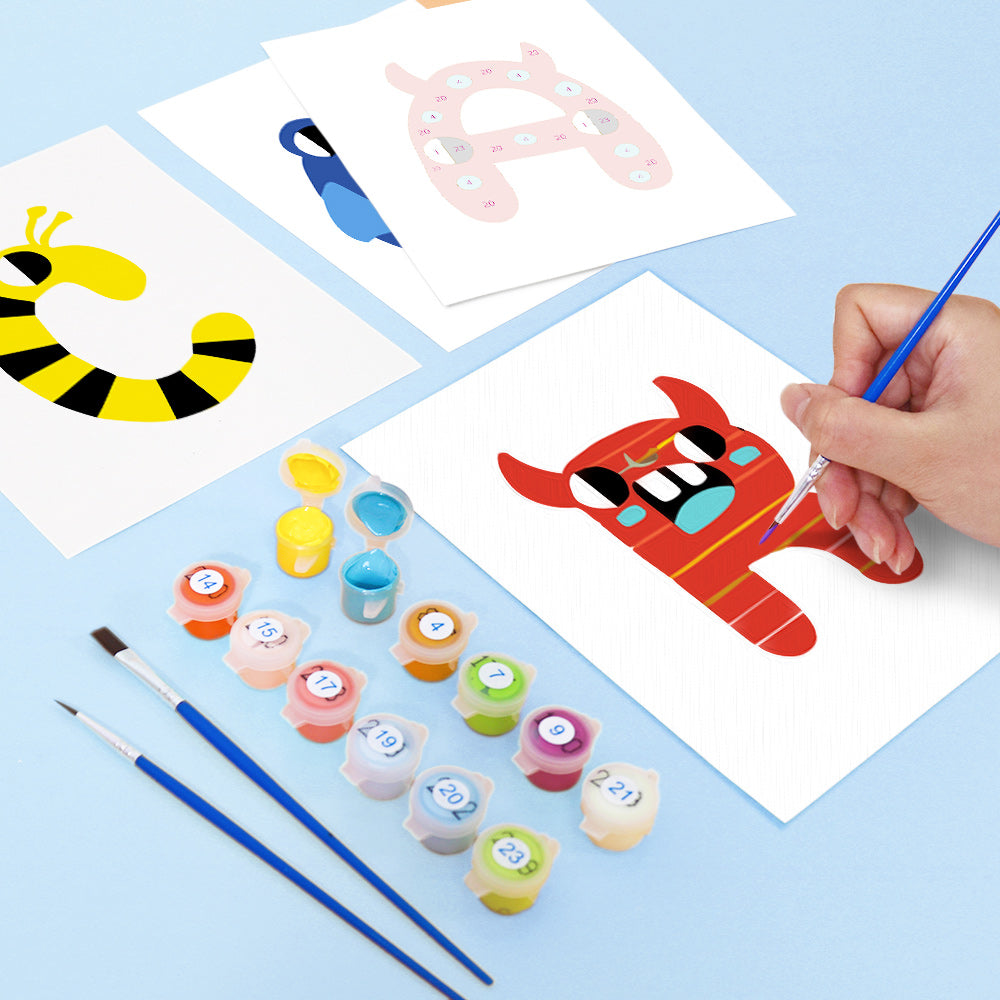 Children's art project with painted letters and colorful paint containers on a blue background