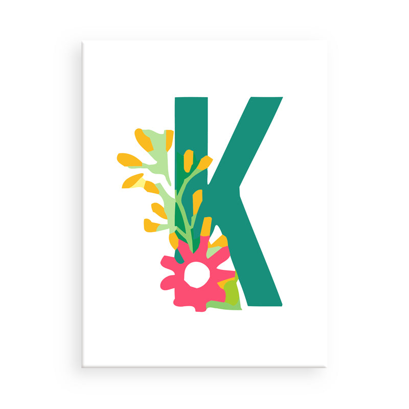 Letter 'K' with floral design on a white background