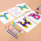 Children's art project with colorful letters on paper and paint supplies.