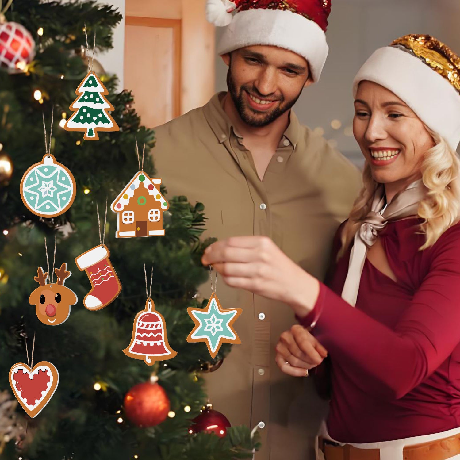 Man and woman in festive hats standing next to a Christmas tree with colorful ornaments.