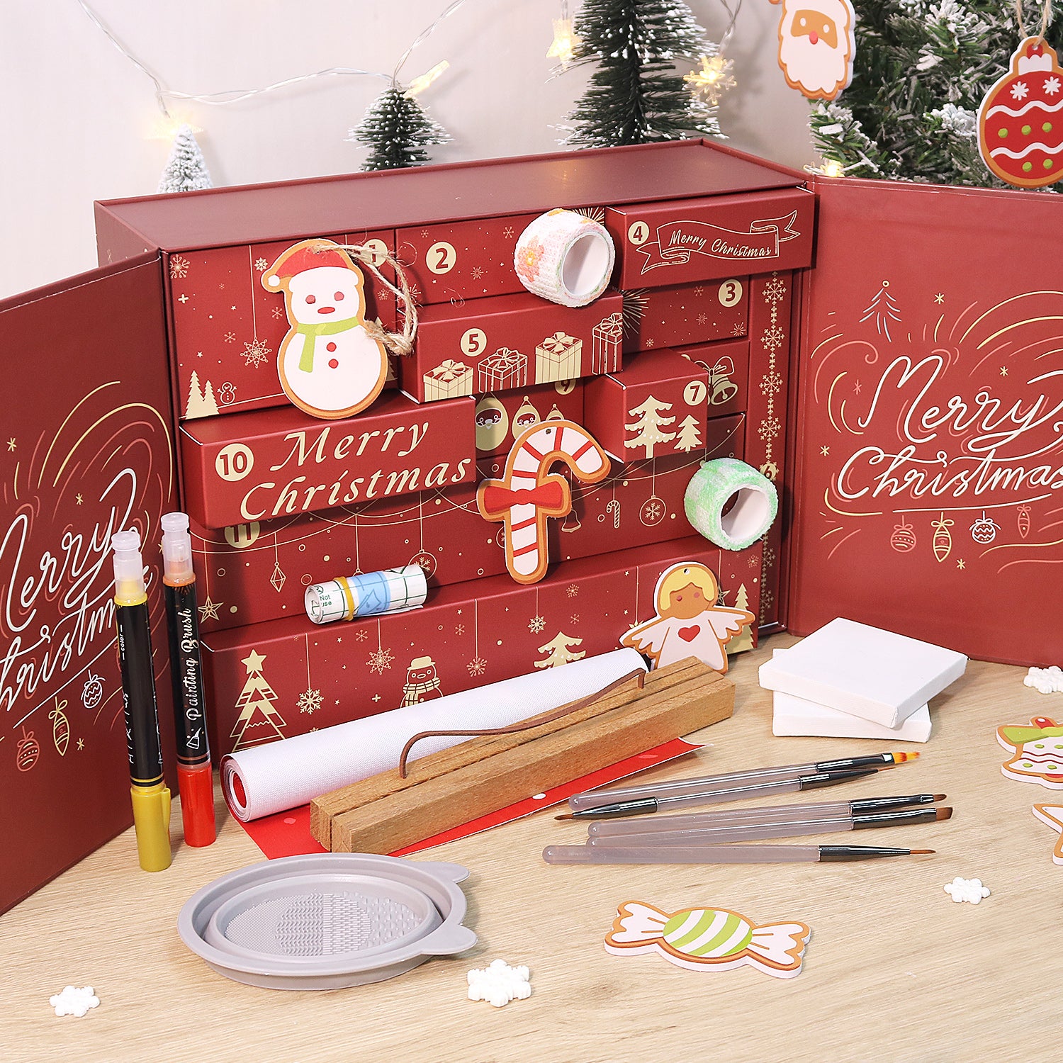 Red Christmas-themed advent calendar with stationery items on a wooden surface.