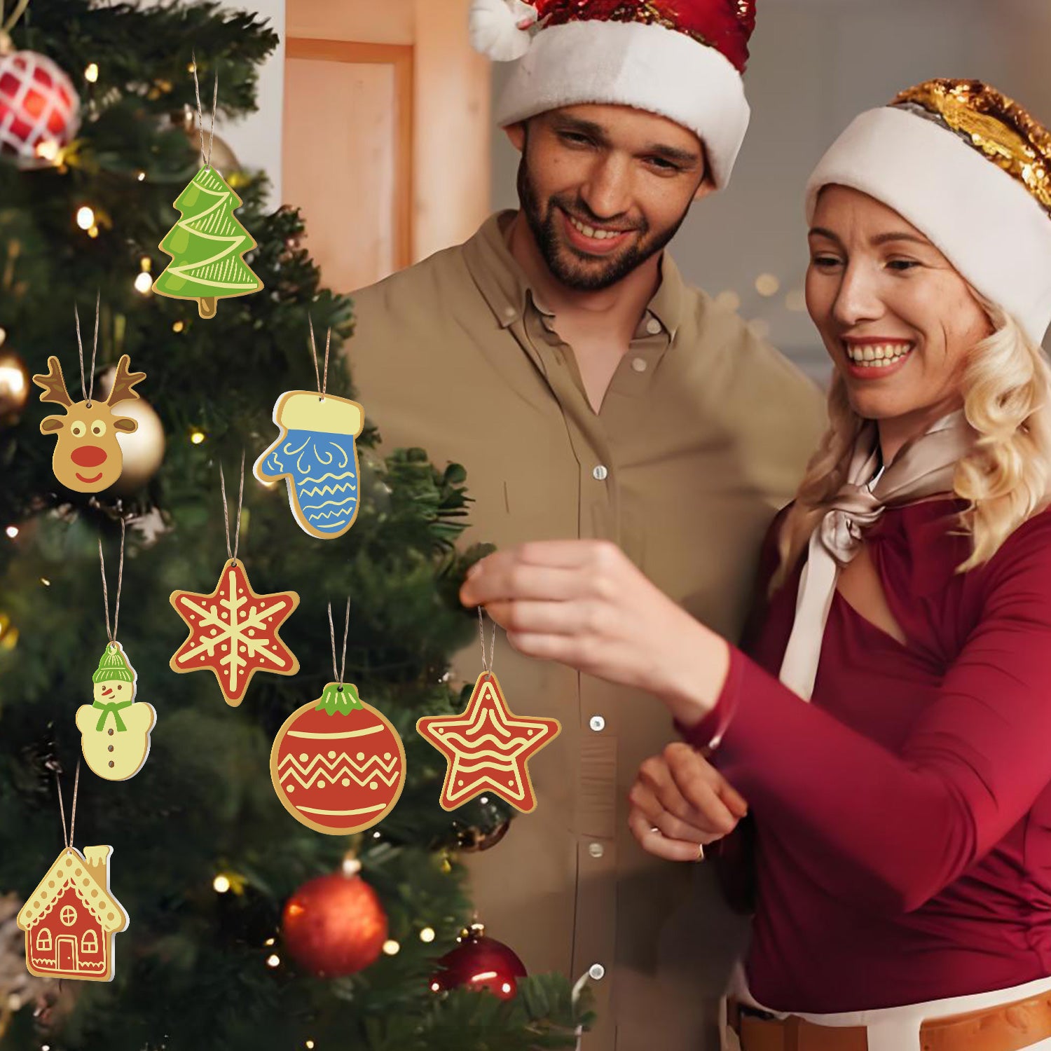 Man and woman in Santa hats decorating a Christmas tree with colorful ornaments.