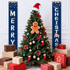 Decorated Christmas tree with ornaments and presents, flanked by 'Merry Christmas' banners.