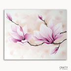 A paint-by-numbers kit depicting a floral design with pink magnolia blossoms on a white background, with the brand 'CRAFTY' visible.