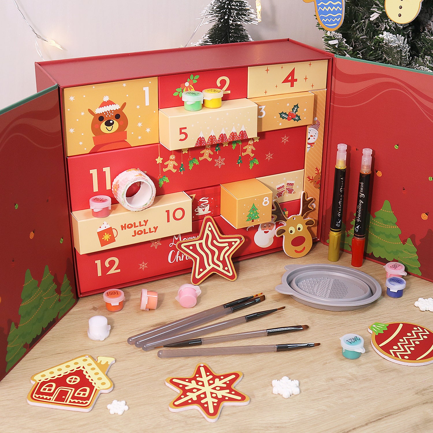 Red advent calendar with Christmas-themed decorations and craft supplies on a wooden surface.