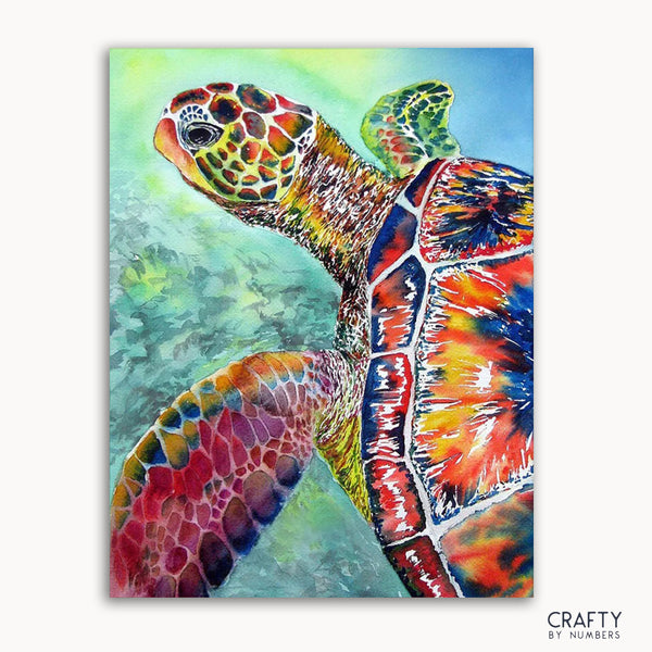 A Paint by Numbers kit depicting a colorful sea turtle on a canvas.