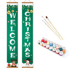 Christmas-themed decorative banners with paint supplies on a white background