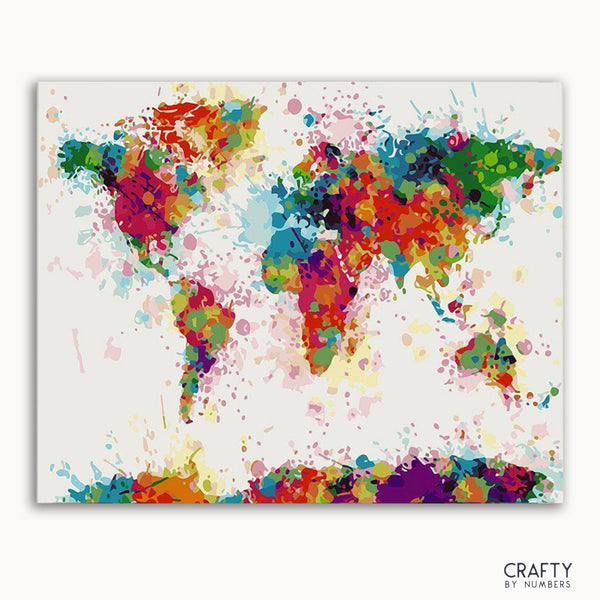 A colorful abstract world map painted on a canvas, with vibrant splashes of red, blue, yellow, and green.