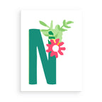 Letter 'N' with a floral design on a white background