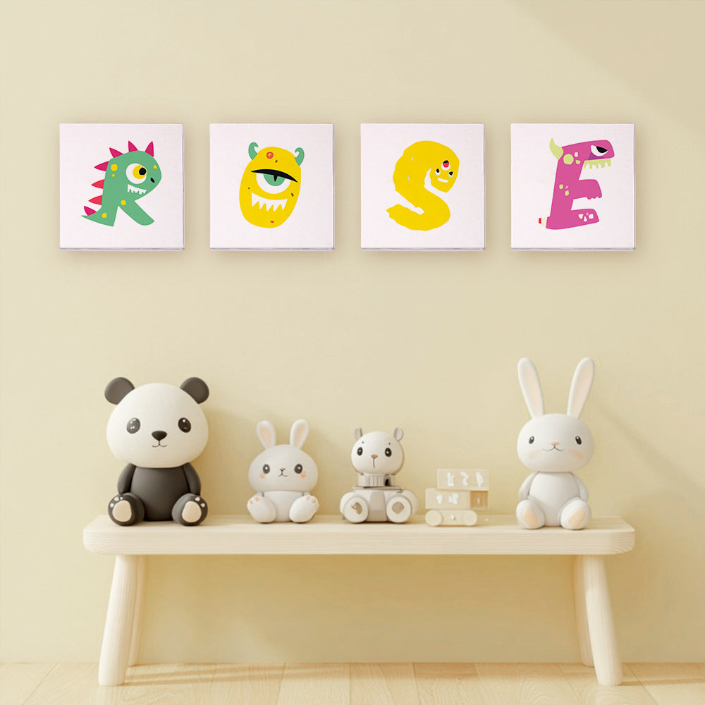 Colorful monster-themed wall art above a wooden shelf with toys on a beige wall.