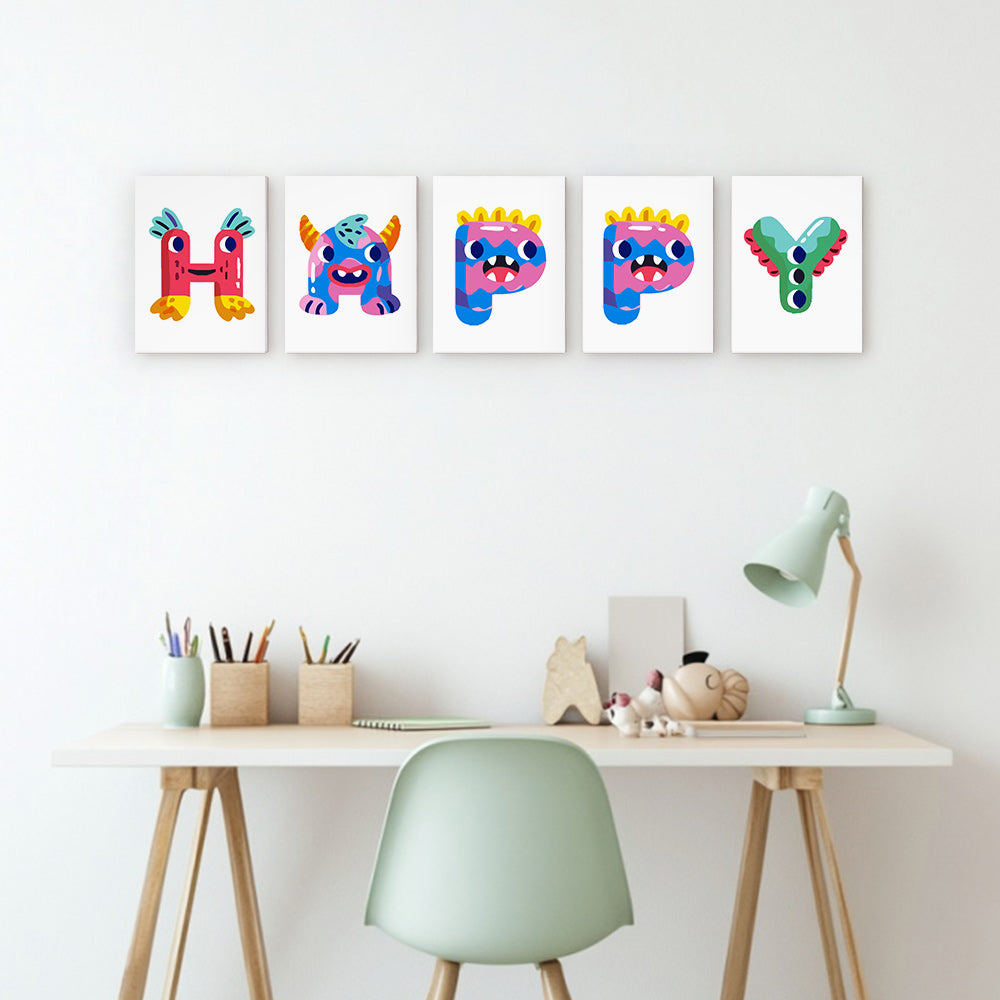 Colorful monster-themed wall art above a desk with stationery items.
