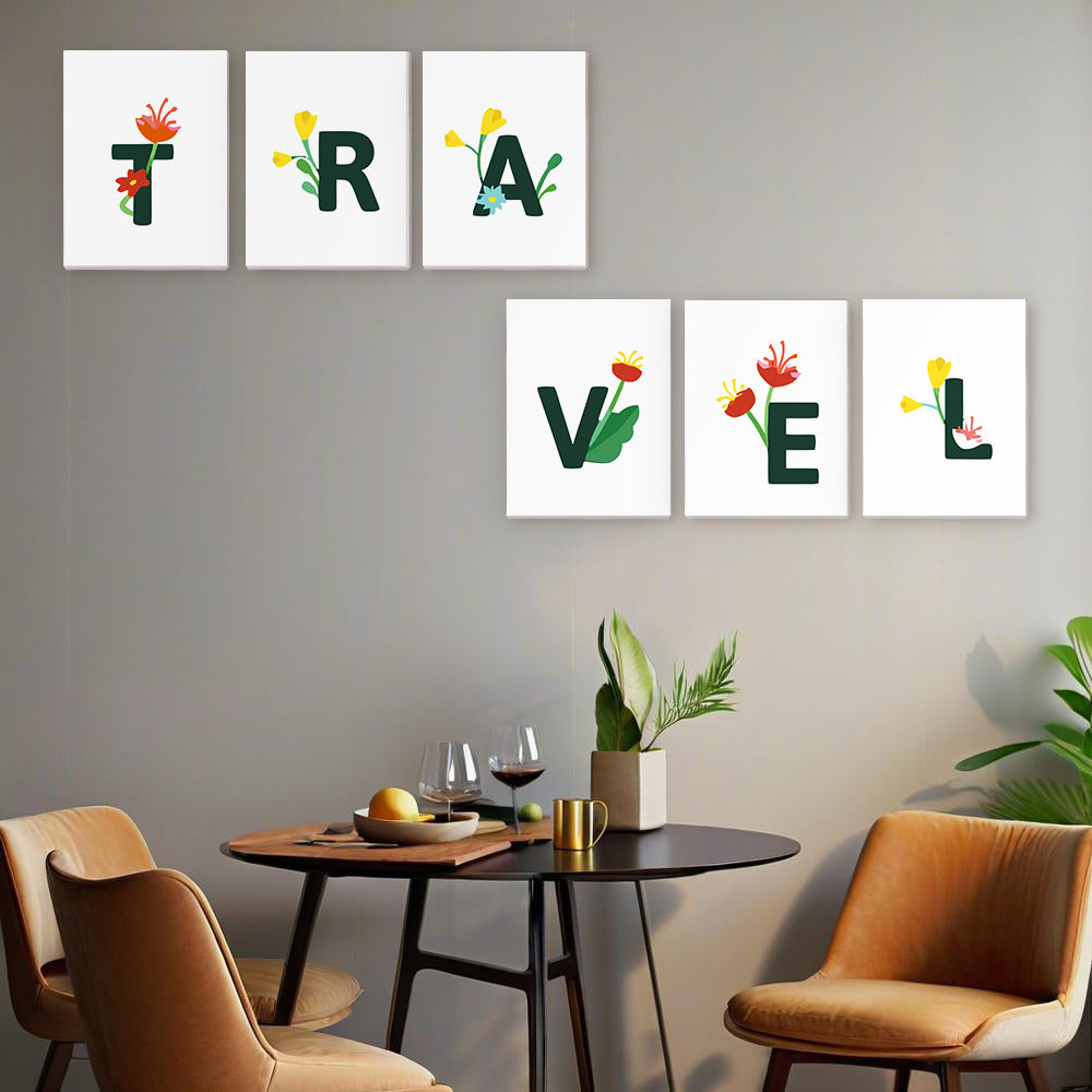 Dekorative Wandkunst mit floralen Buchstaben mit der Aufschrift „TREASURE“ in einem modernen Esszimmer.