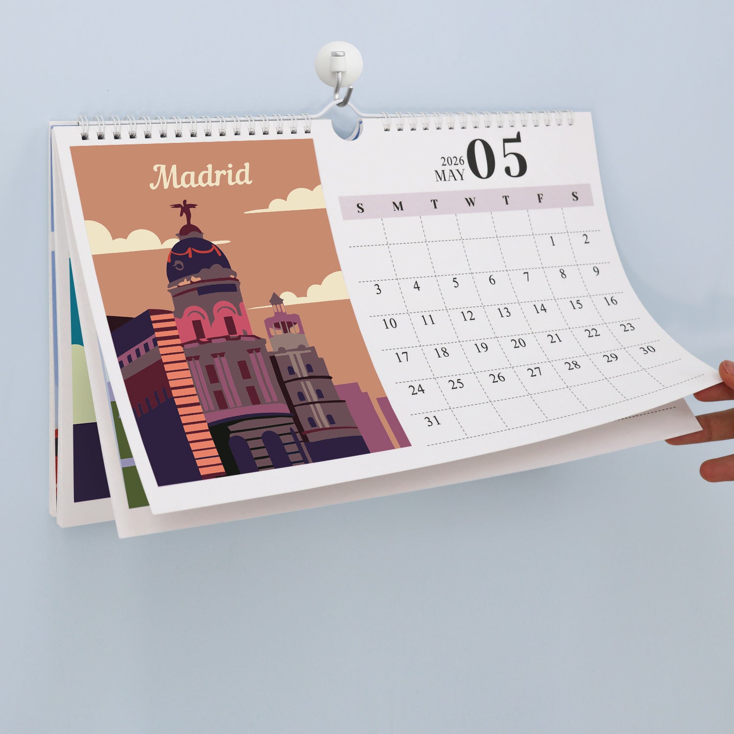 Calendar with Madrid illustration on a light blue background
