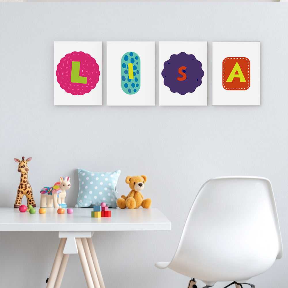 Colorful name wall art above a child's desk with toys and a chair.