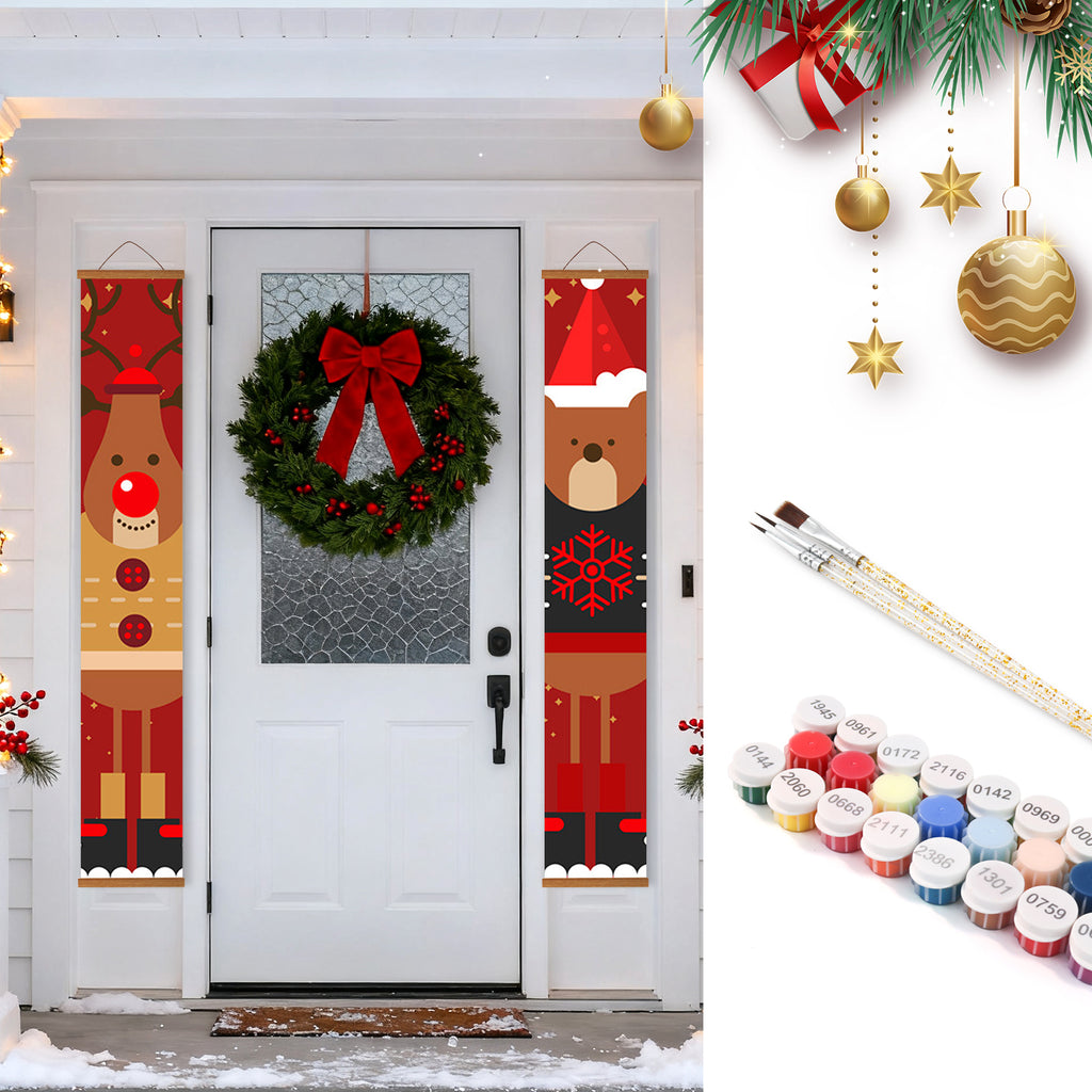Dekorative Weihnachtsbanner mit Rentier- und Weihnachtsmannmotiven an einer Tür, mit Kranz und Goldornamenten.