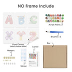 Product bundle with linen canvas, acrylic paints, brushes, box, hangers, and sticker on a white background.
