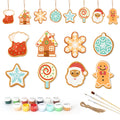 Set of Christmas-themed cookie cutters with paint cans and brushes on a white background