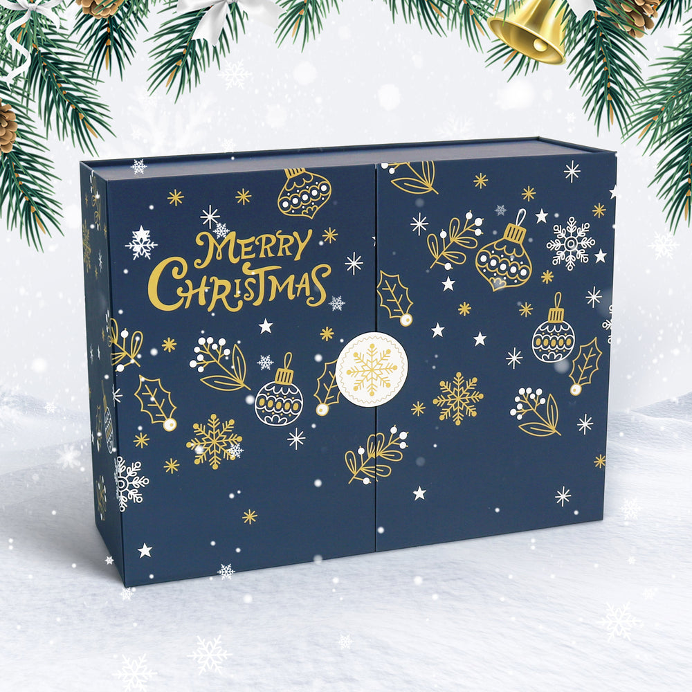 Blue Christmas-themed box with gold and white decorations on a snowy background