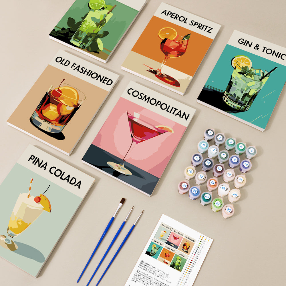 Assorted mini paint by numbers kits with vibrant completed artwork