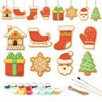 Set of Christmas-themed cookie cutters with paint supplies on a white background