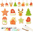 Set of Christmas-themed ceramic decorations with paint cans and brushes on a white background