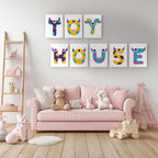 Children's room with pink sofa, toys, and colorful wall art spelling 'TOY HOUSE'.