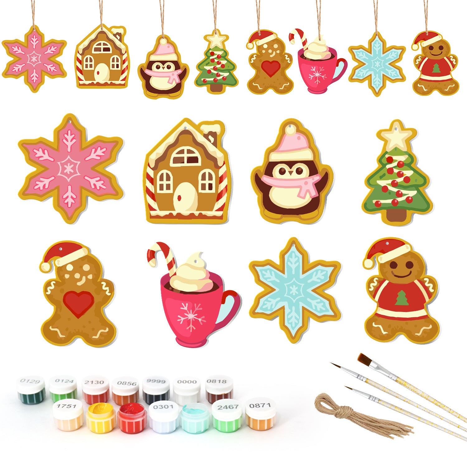 Set of Christmas-themed ceramic decorations with painting supplies on a white background