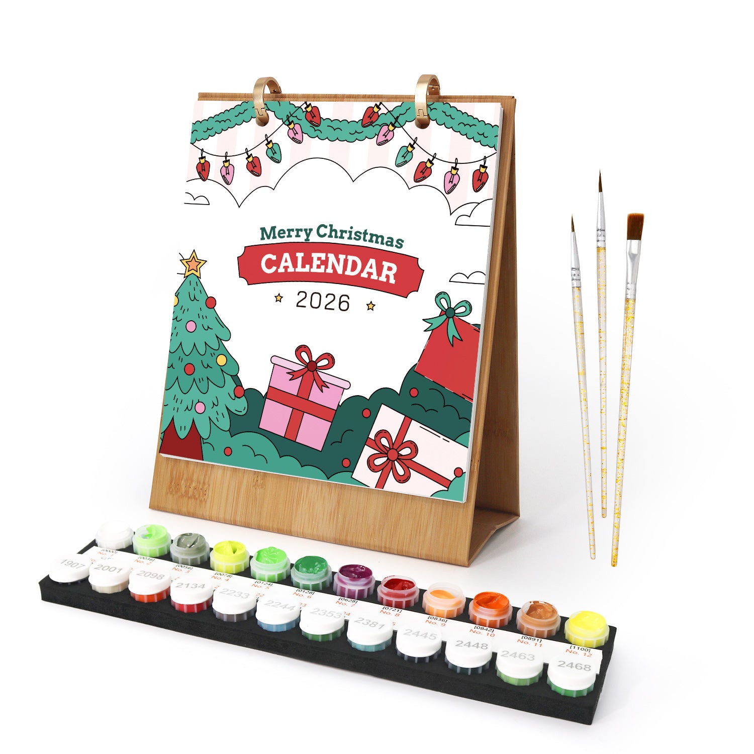 Christmas-themed calendar with paint set and brushes on a white background